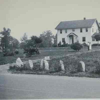 The home of Clarence and Myra Hopper Wanamaker before the highway ramp took the frontage away in 1933. Clarence and Mildred Peterson are seen in the photo