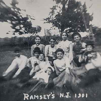Retaliate family group photo outside on their farm.