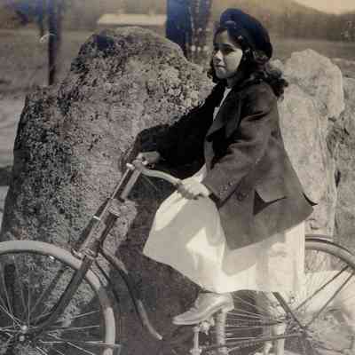 Emily Mayer on a bicycle