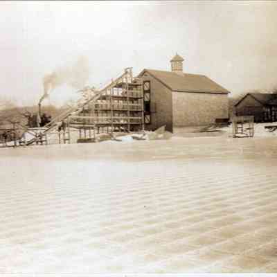 Ict House and Ice Ladder on Frozen Pond
