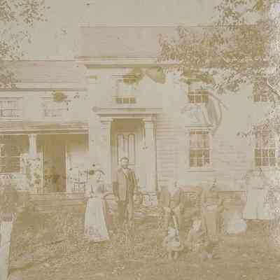 David J. Carlough and Family outside their House