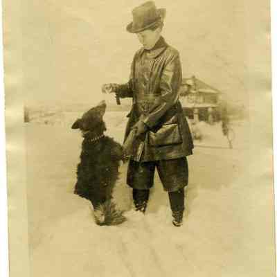 Annie Carpenter Winter with dog in snow, Mahwah