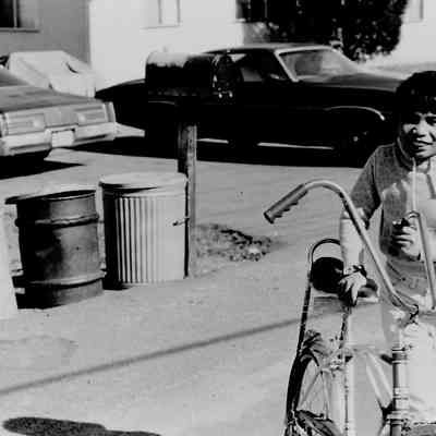 Boy with bicycle