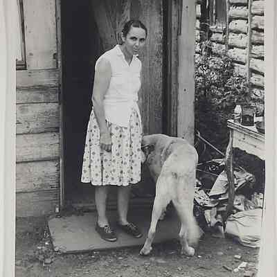 Woman with dog, ca. 1965