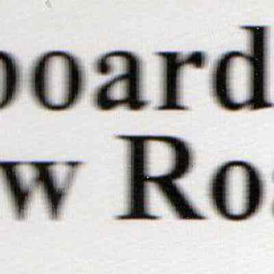 White Clapboard Farmhouse Caption