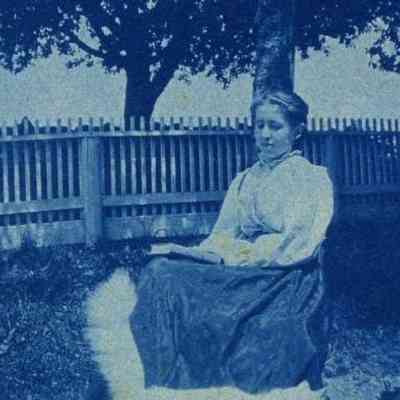 Annie Carpenter at Valley Farm, reading a book