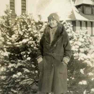 Unidentified person with an old church