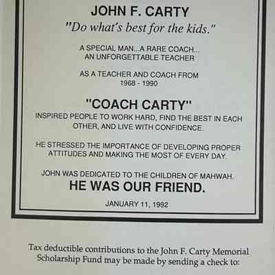 A printed copy of the plaque made in John F. Carty's honor