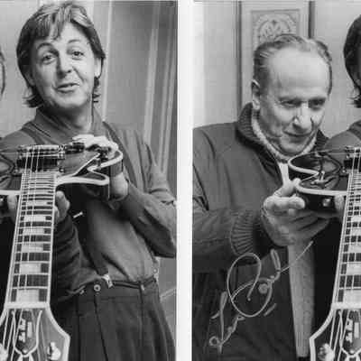 Les Paul and Paul McCartney with guitars