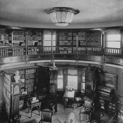 Vail Mansion Library showing the mezzanine balustrade in context - digitized image by Keith Chamberlin: This room in the North tower was the Lyndon State College bookstore during the 1960s and 1970s.