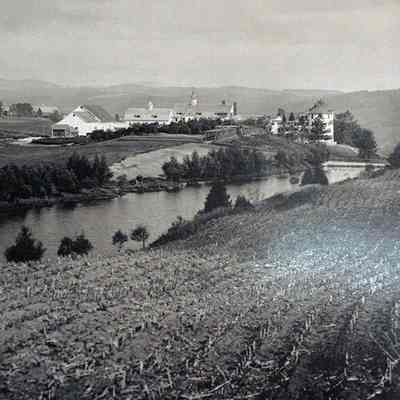 Long shot of Vail Mansion, south side: The Aldrich house is visible at far left. This building still stands in 2024.