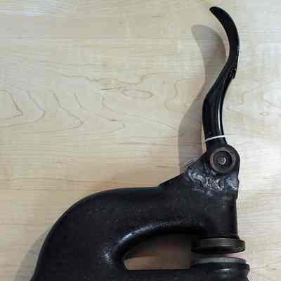 Vermont Teachers College hand embossing-official seal - side view - note weld at handle base