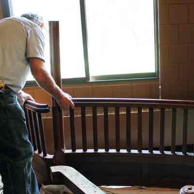 William Graves and Jeffrey Paine piece together sections of the Vail Library balustrade in Vail Museum