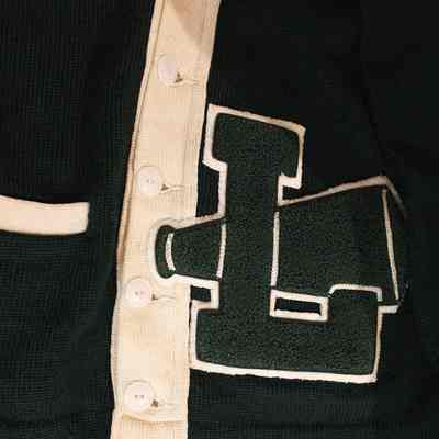 Closeup of the Lyndon Teachers College varsity letter for cheerleading "L"