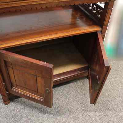Detail of middle shelf with bottom cabinet doors open in roll-top desk/secretary: Photo by Michael Thurston