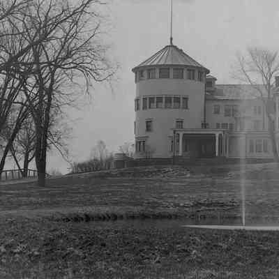 Vail - Mansion -Circa 1920's - Lyndon Center, Vermont: This image has been digitally manipulated with much of the damage, dust and dirt removed and the exposure has been manipulated to accentuate contrast and detail. It is the same image as the primary image in size and scale, and exists in digital form only. As mentioned above, of particular interest in this picture is the structure to the left of the North Tower at the center of the picture. There is a cone-shaped roof and spire on whatever this structure is. Of all the pictures of Vail Mansion our museum has, this is the only image I can recall that shows this structure on the grounds of Vail Mansion.