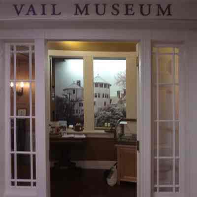 Vail Museum entrance showing the Vail Mansion mural within - photo by John Dumville: Vail Mansion mural image courtesy Jenks Studio - St. Johnsbury, VT