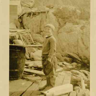 boy on docks, Nova Scotia (Knickle Studio)