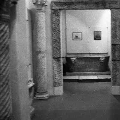 Funerary pedestal along left wall in 2nd gallery