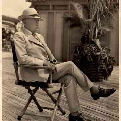 JHHSr in lounge chair, Boca Raton Club, Florida