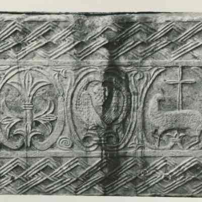 Marble Agnus Dei & Peacock Plaque (near drawbridge)