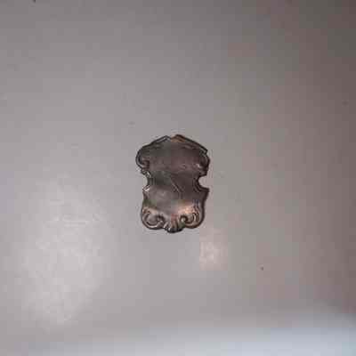 HM474.2 Pewter Liquid Dispenser's Shield (in Irene's closet)