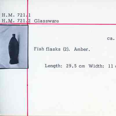 Pair of Amber Glass Fish Bottles