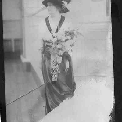 lady wearing hat with flowers