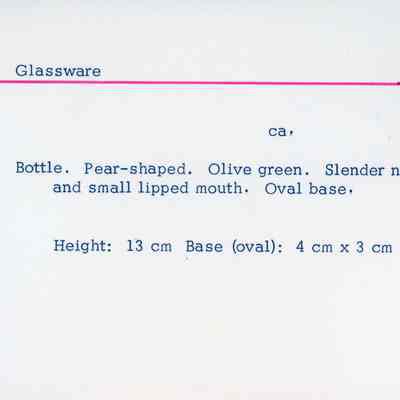 green glass pear-shaped bottle