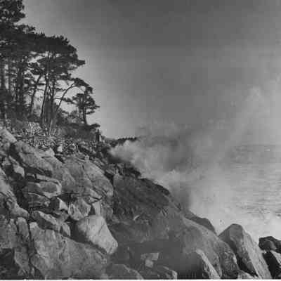 1960-1970s ca, surf crashing on rocks