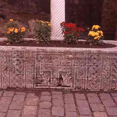 Cross Sarcophagus (along bell tower arches)