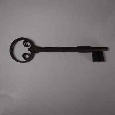 Key to Iron Plated and Studded Door with 2 Arch Detail