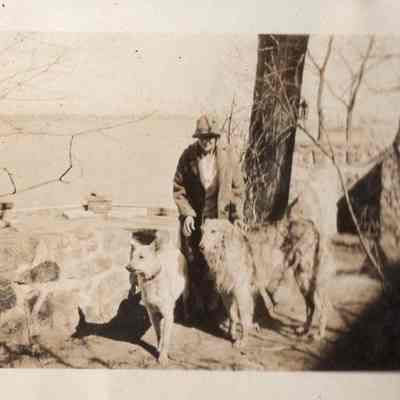 1927 Vacation album, p(44e) castle construction, Irene with dogs