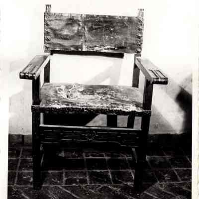 Carved Wood Chair with Leather Upholstery