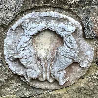 Roundel of 2 Kissing Animals (on Cat Garden Fountain)