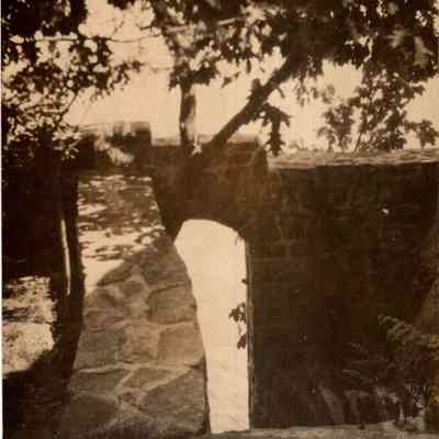 Bungalow stone arch doorway (A Weston postcard)