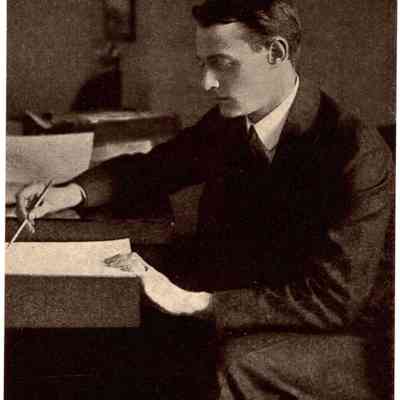 1910-1925 JHHJr writing at desk