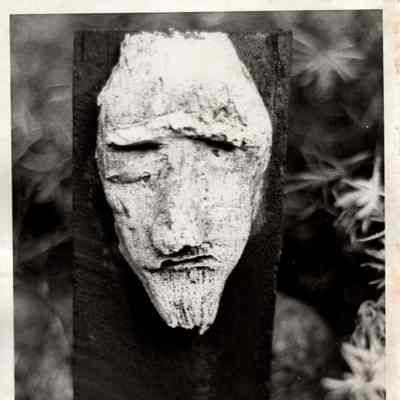 Carved Wooden Face of a Man