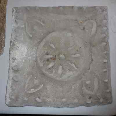 Sand Cast Relief of 4 Cornered Flower