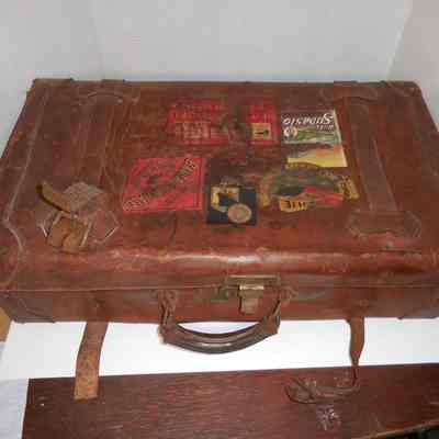 Leather Suitcase with Travel Stickers
