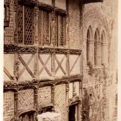 GRM p(13c) Courtyard facing 14th century storefronts