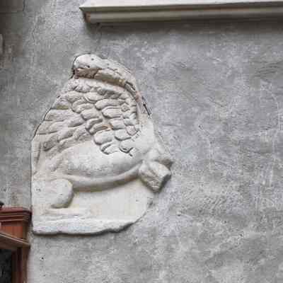 Stone Relief of a Winged Creature (possibly a lion)