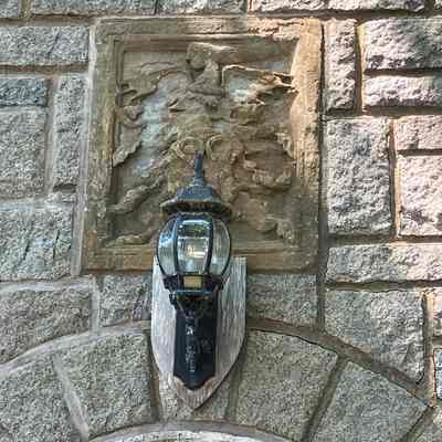 Stone Coat of Arms Plaque (plaza side of bell tower)