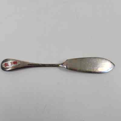 Back of silver butter knife