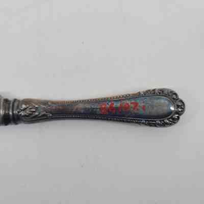Back of handle showing discoloration and accession number - 86.107i