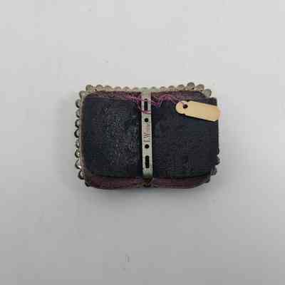 Back of black leather shoe buckle