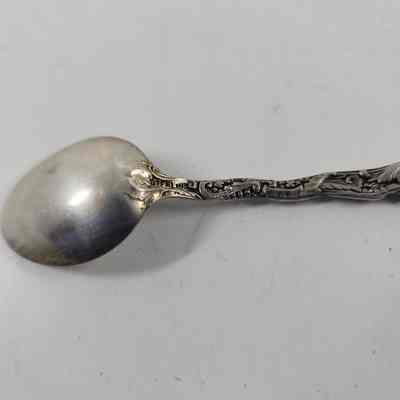 "Sterling" engraving on back of spoon handle