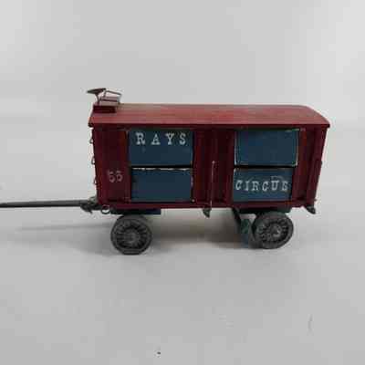 Opposite side of red boxcar with "RAYS CIRCUS" and "55" written in white