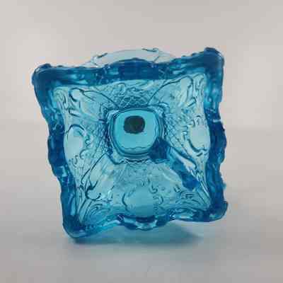Bottom of blue glass oil lamp