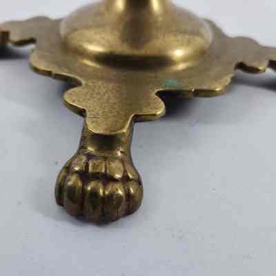 Clawed foot of candlestick